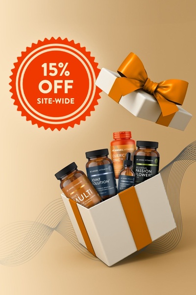 A clean, high-contrast creative featuring a collection of supplement bottles emerging from an open gift box to promote a 15% site-wide discount.